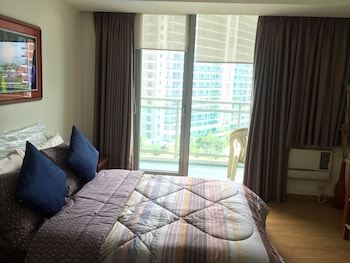 family condo by ia at azure urban resort residences