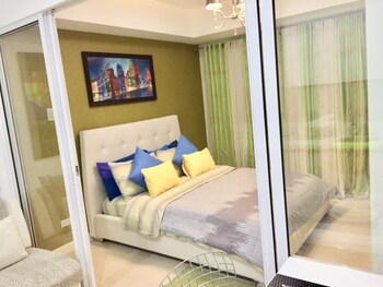 family condo by ia at azure urban resort residences