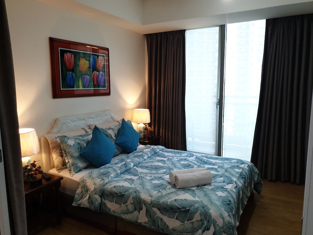 family condo by ia at azure urban resort residences