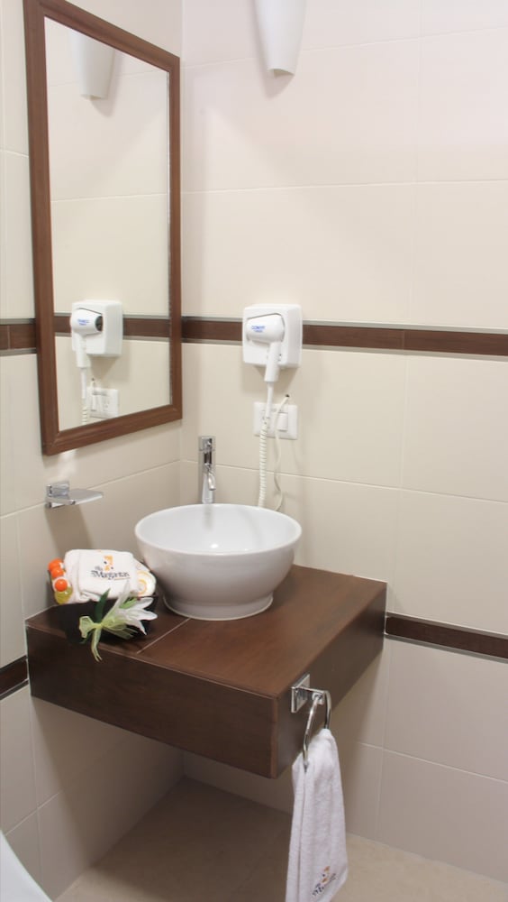 hotel villa las margaritas sucursal caxa