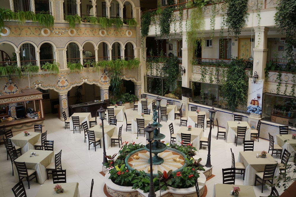 hotel villa las margaritas sucursal caxa