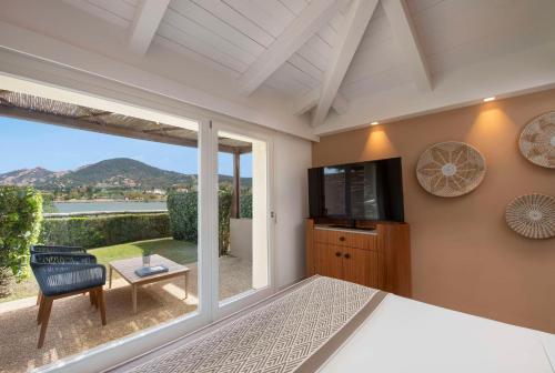 baia di chia resort sardinia curio collection by hilton