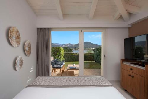 baia di chia resort sardinia curio collection by hilton