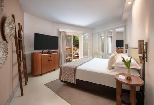 baia di chia resort sardinia curio collection by hilton