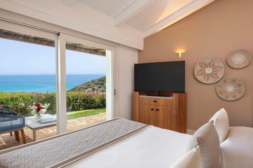 baia di chia resort sardinia curio collection by hilton