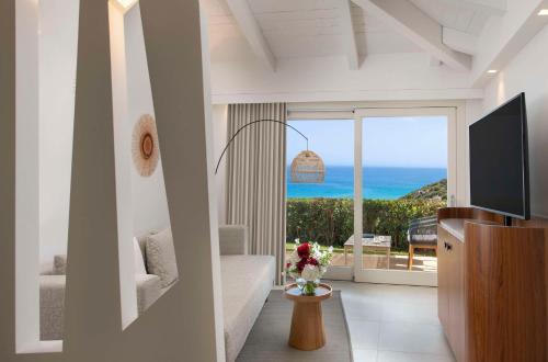 baia di chia resort sardinia curio collection by hilton
