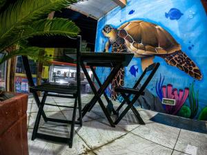 pe na areia beach hostel