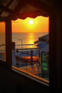 pe na areia beach hostel