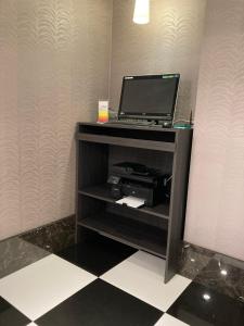 kindness hotel houyi jiuru