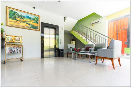 reddoorz plus hertasning area