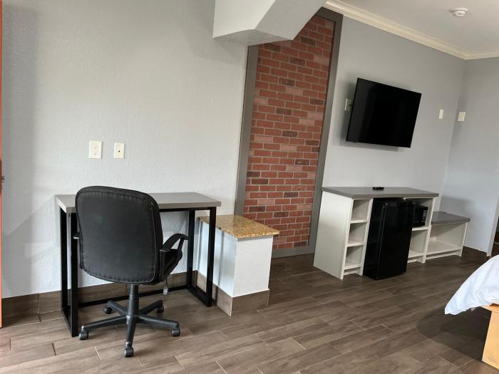 symphony inn and suites