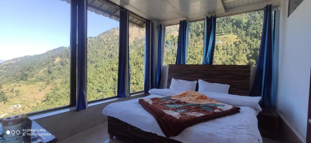 sunrise resort dhanolti