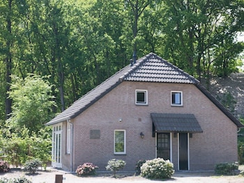 characteristic holiday home with a terrace at bedafse bergen