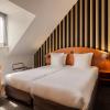 aris grand place hotel