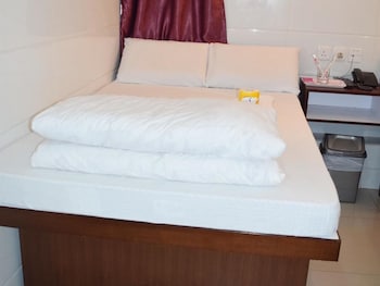 pay less guest house hostel