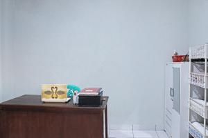 amor homestay near eltari international airport mitra reddoorz
