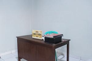 amor homestay near eltari international airport mitra reddoorz