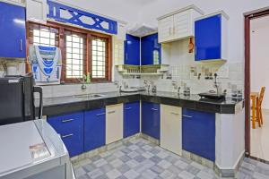 capital o 84184 pop tavern kazhakkottam