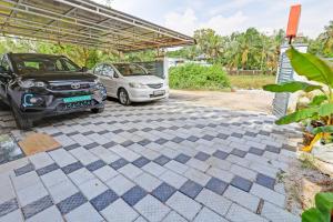 capital o 84184 pop tavern kazhakkottam