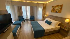 pelit troya hotel