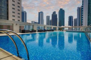 wyndham grand doha west bay beach