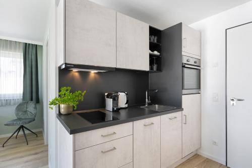 snooze apartments alling