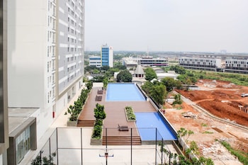 homey and minimalist studio at vasanta innopark apartment