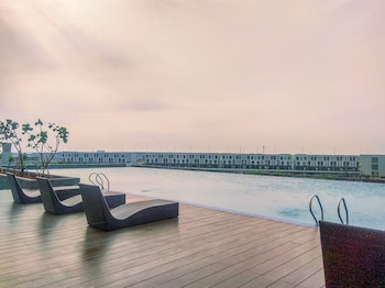 homey and minimalist studio at vasanta innopark apartment