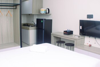 homey and minimalist studio at vasanta innopark apartment