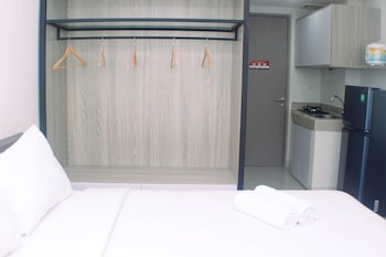 homey and minimalist studio at vasanta innopark apartment