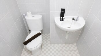 modern and homey 2br at puncak kertajaya apartment