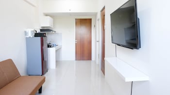 modern and homey 2br at puncak kertajaya apartment