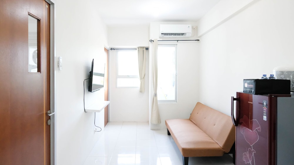modern and homey 2br at puncak kertajaya apartment