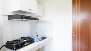 modern and homey 2br at puncak kertajaya apartment