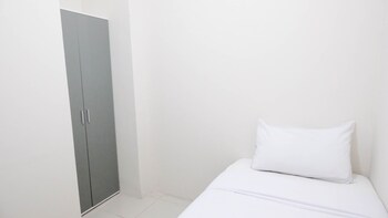 modern and homey 2br at puncak kertajaya apartment