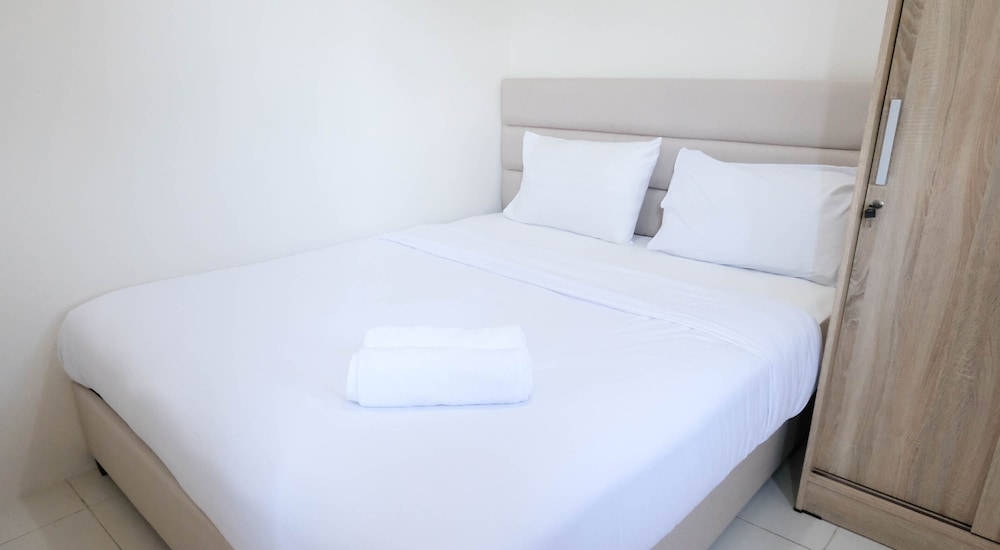 modern and homey 2br at puncak kertajaya apartment