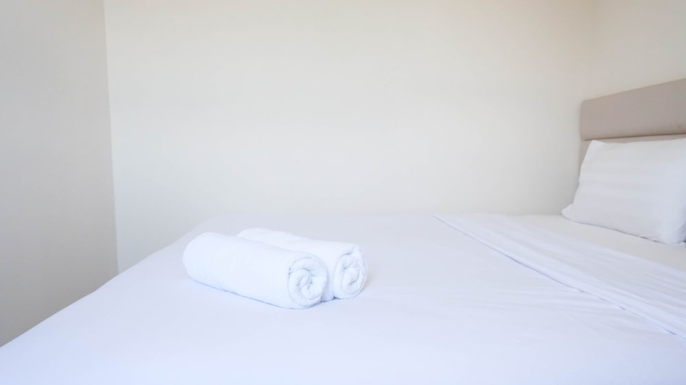modern and homey 2br at puncak kertajaya apartment