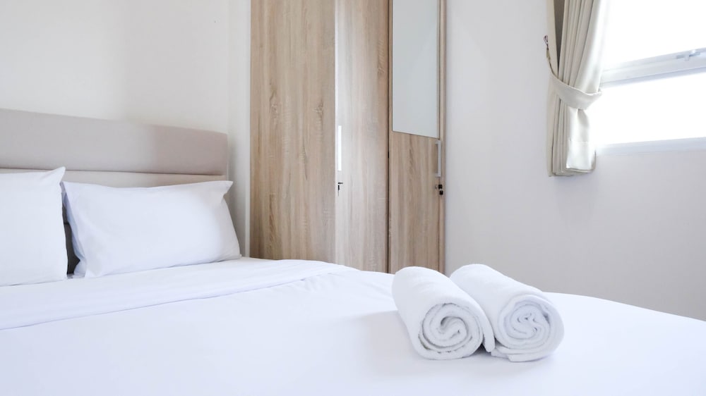 modern and homey 2br at puncak kertajaya apartment