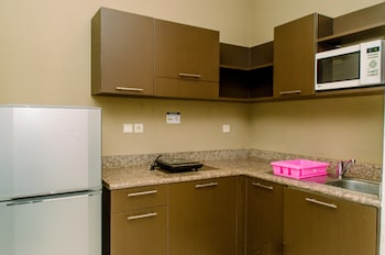 cozy living 1br the bellezza apartment