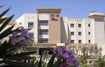 swiss inn plaza