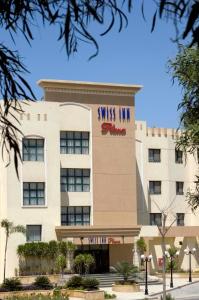 swiss inn plaza