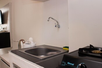 cozy living studio at urbantown apartment karawang