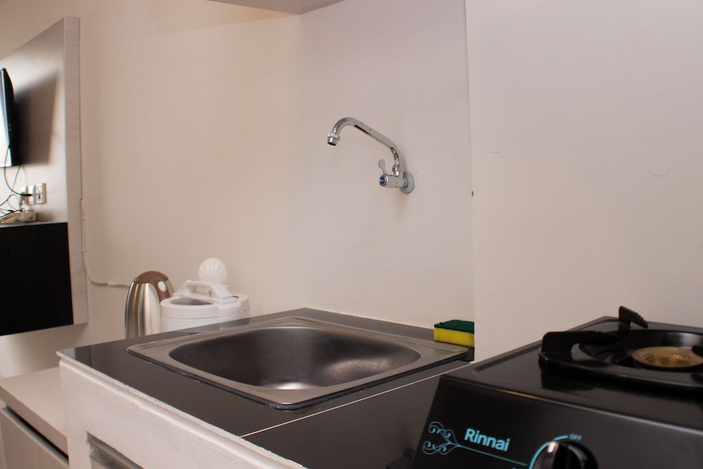 cozy living studio at urbantown apartment karawang