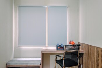 comfortable pool view studio room at gateway park lrt city bekasi apartment