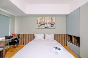 comfortable pool view studio room at gateway park lrt city bekasi apartment