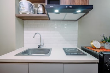 comfortable pool view studio room at gateway park lrt city bekasi apartment