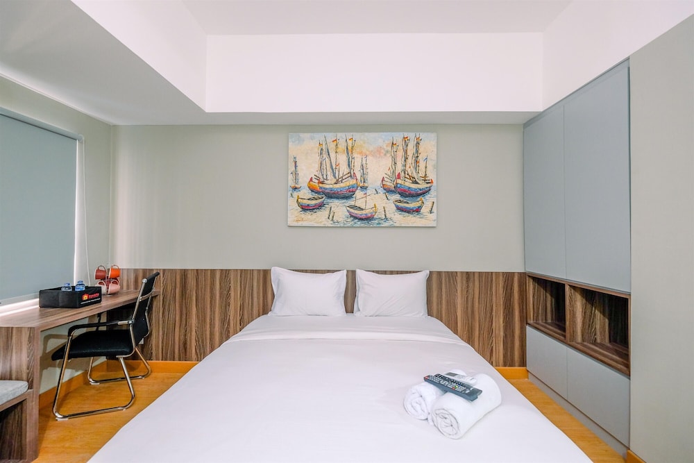 comfortable pool view studio room at gateway park lrt city bekasi apartment