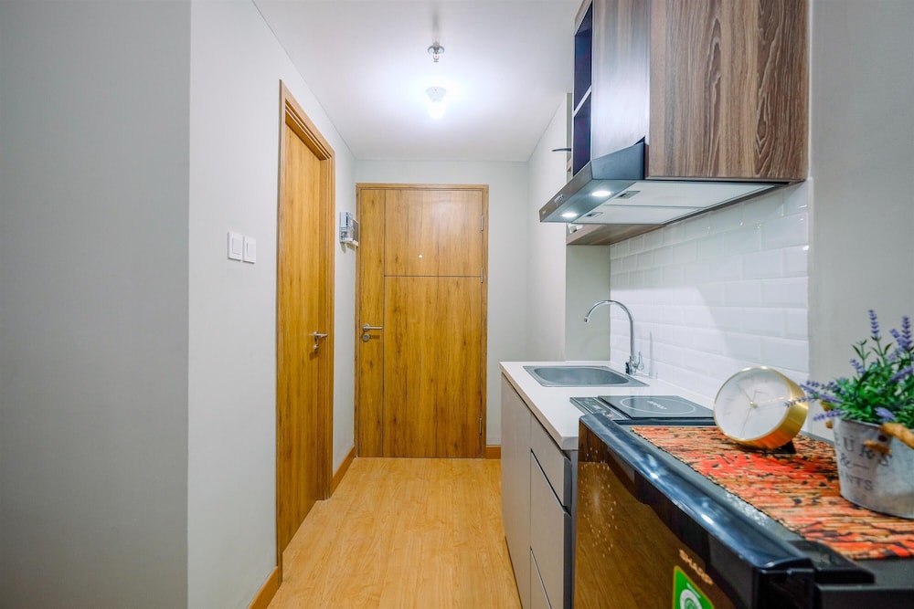 comfortable pool view studio room at gateway park lrt city bekasi apartment