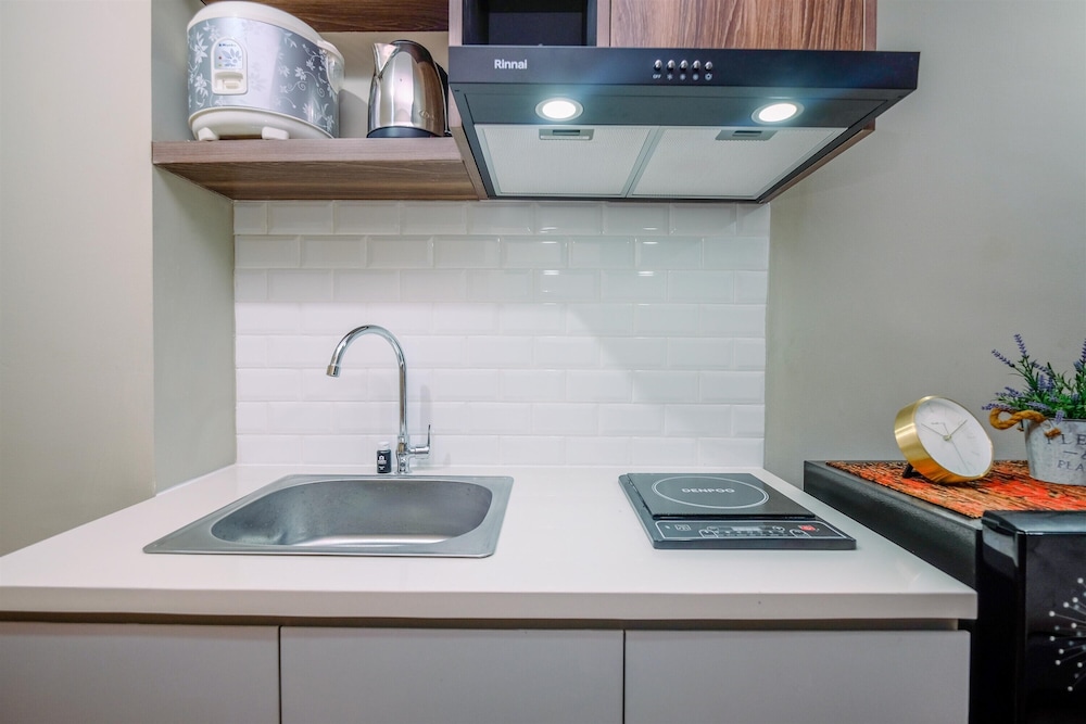comfortable pool view studio room at gateway park lrt city bekasi apartment