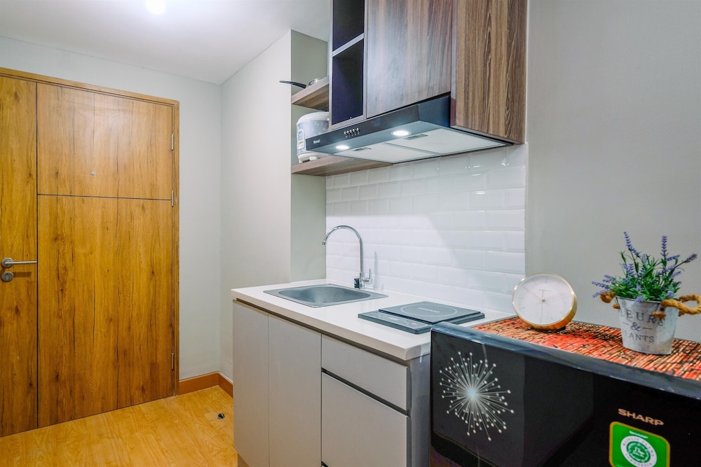 comfortable pool view studio room at gateway park lrt city bekasi apartment